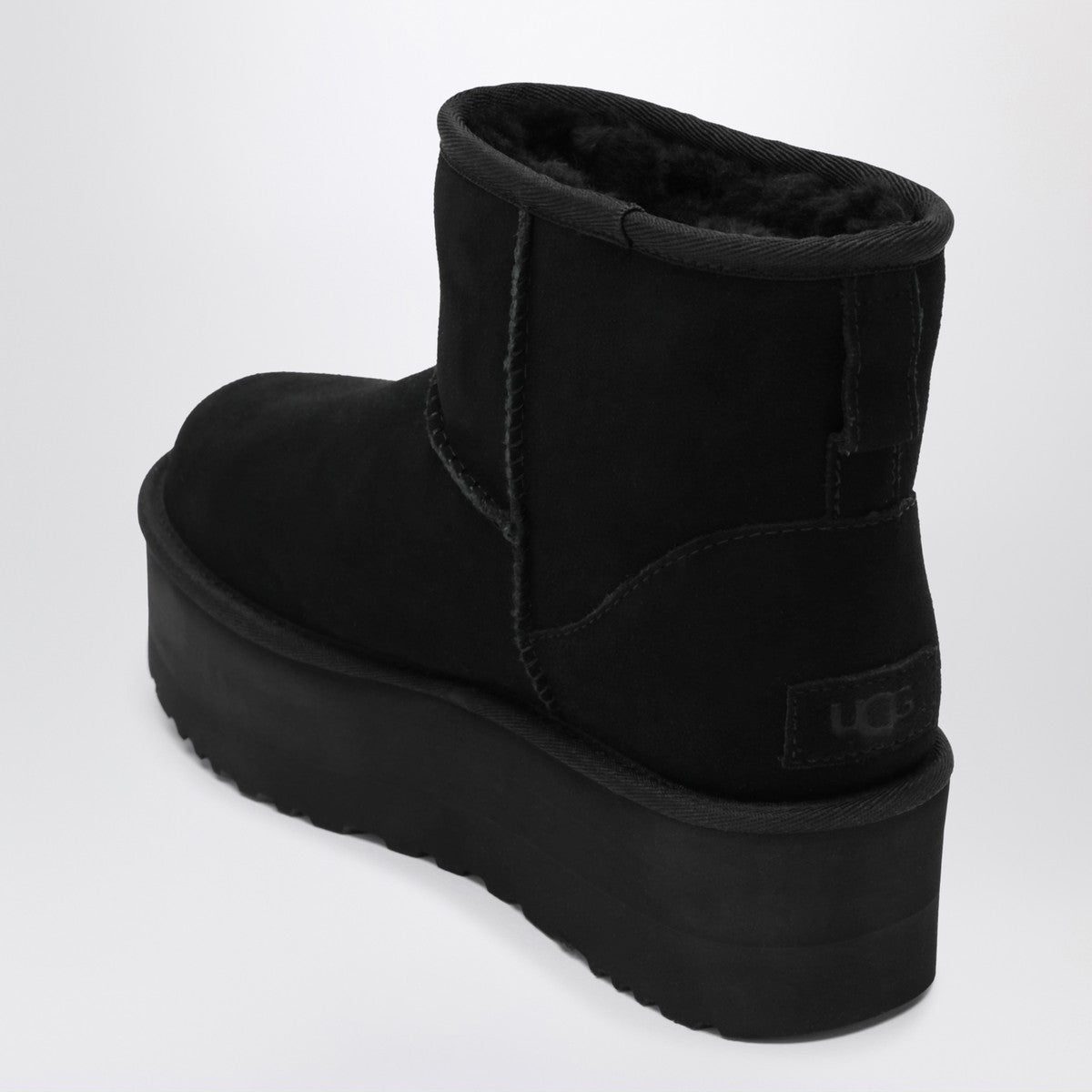 Bottes à plateforme Ugg Classic Mini en daim noir
