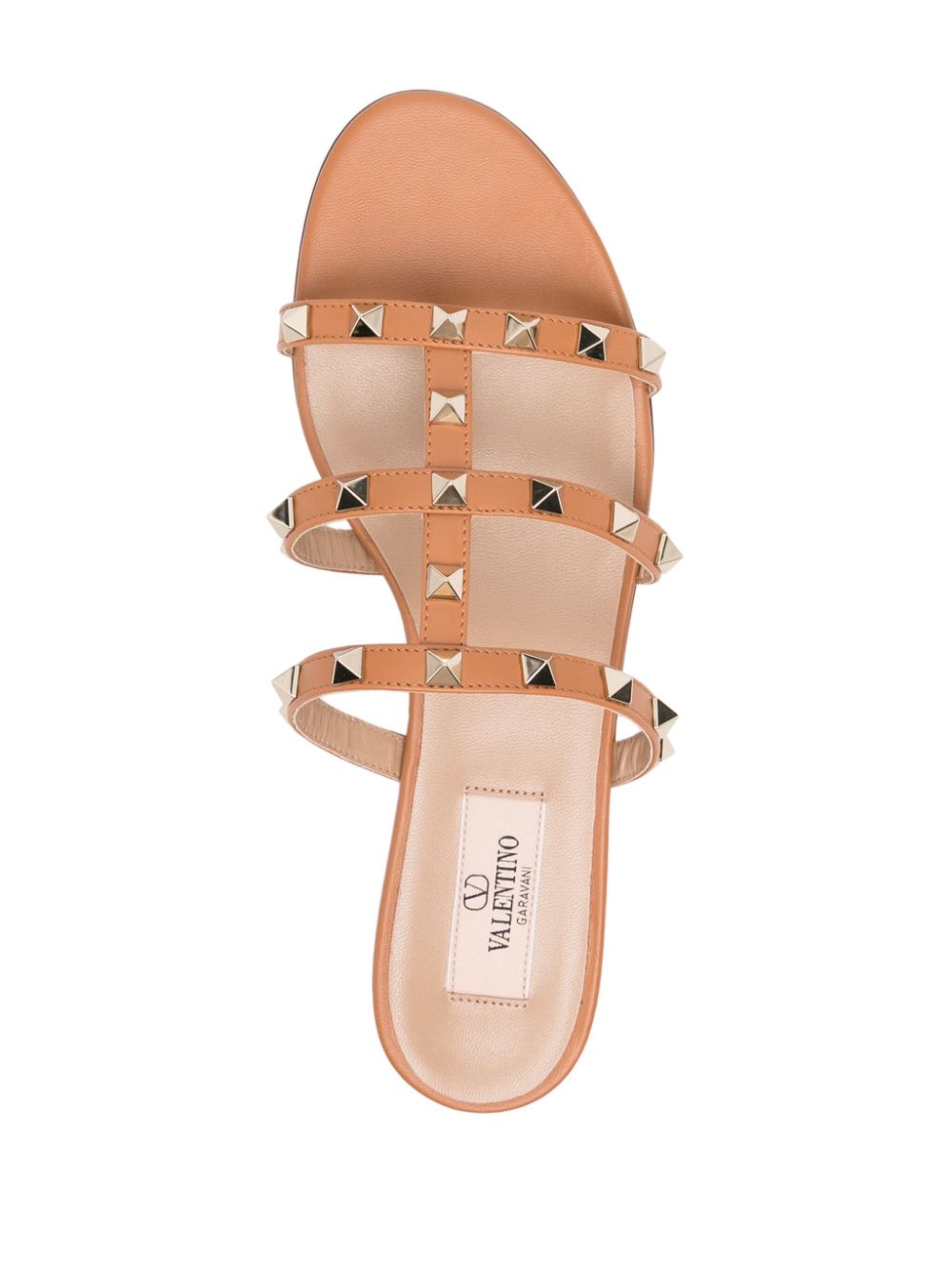 Sandales plates Valentino Garavani en cuir marron Rockstud