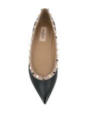 Chaussures plates Valentino Garavani en cuir noir Rockstud