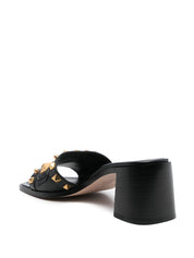 Sandales Valentino Garavani Mules en cuir noir