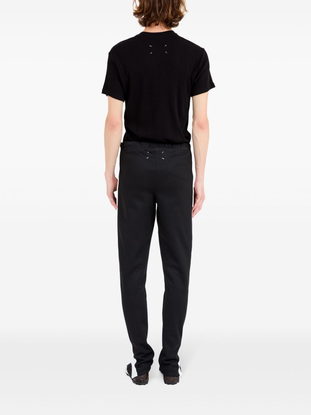 Pantalon Maison Margiela noir avec détails à rayures