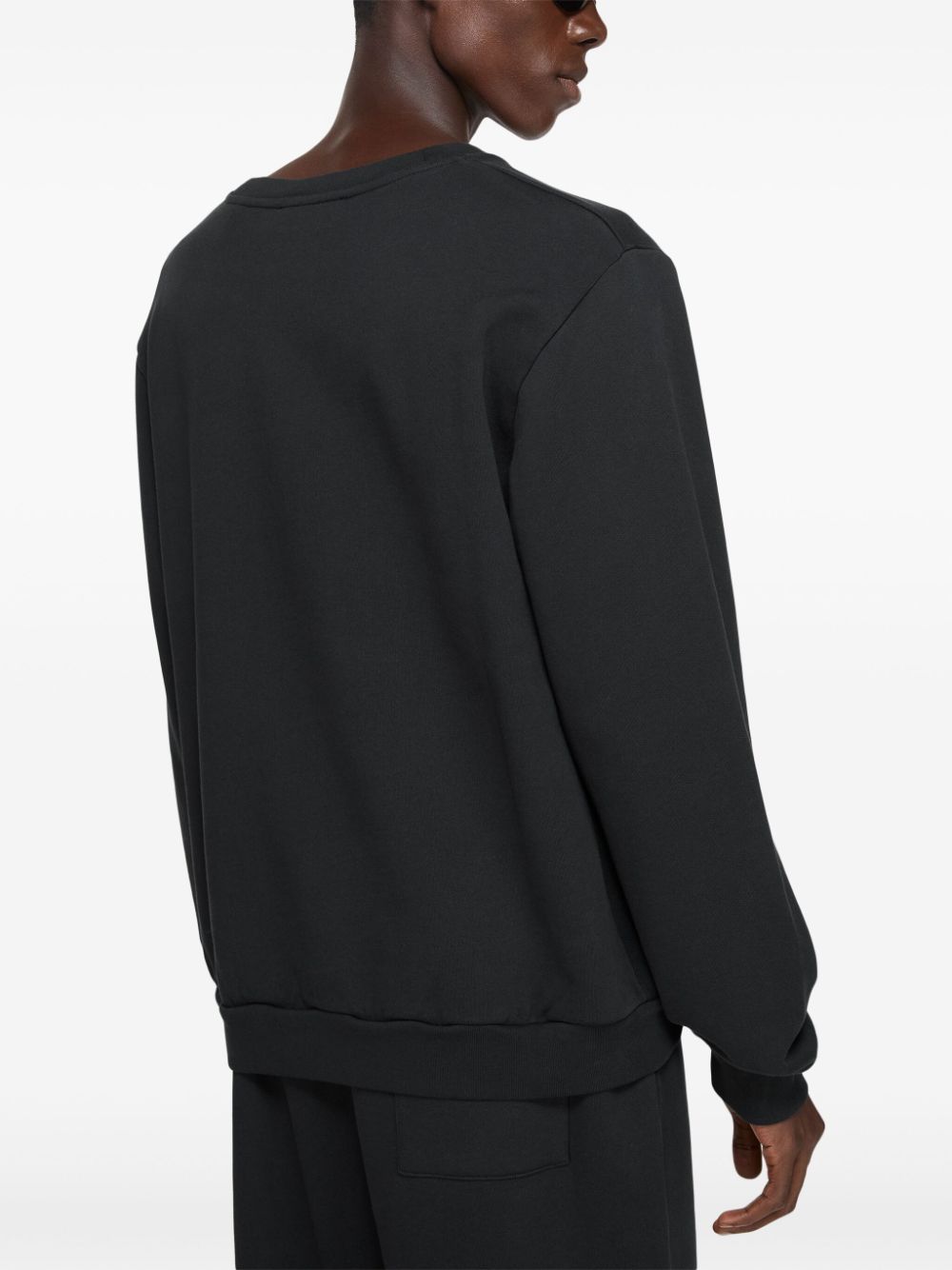 Pull Acne noir coupe unisexe