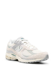 Zapatillas New Balance de malla de ante de becerro blanco