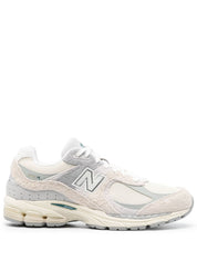 Zapatillas New Balance de malla de ante de becerro blanco