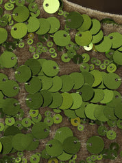 Top Ganni en velours vert pailleté