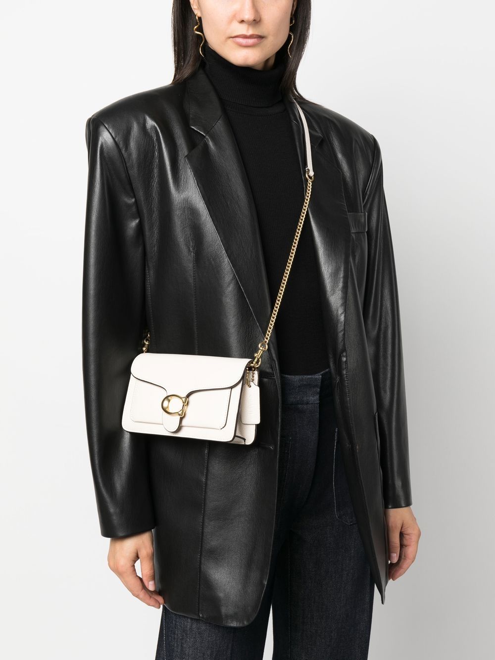 Coach Bags.. White leather clutch