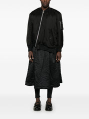 Abrigos negros Comme des Garcons