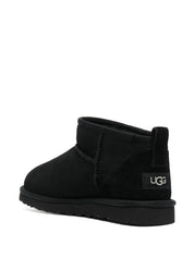 Bottes Ugg Australia noires en cuir de veau et peau de mouton