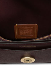 Bolsos Coach.. Bandolera de piel marrón