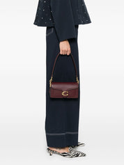 Bolsos Coach.. Bandolera de piel marrón