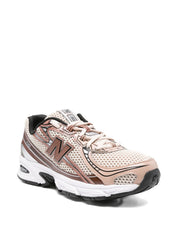 Zapatillas New Balance de malla beige con cordones