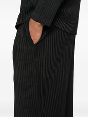 HOMME PLISSE' ISSEY MIYAKE Trousers — Black, Pleated