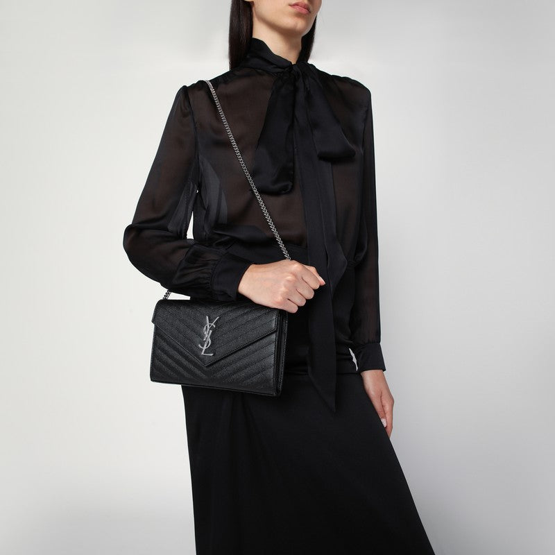 Saint Laurent Clutch with chain Cassandre in black lambskin