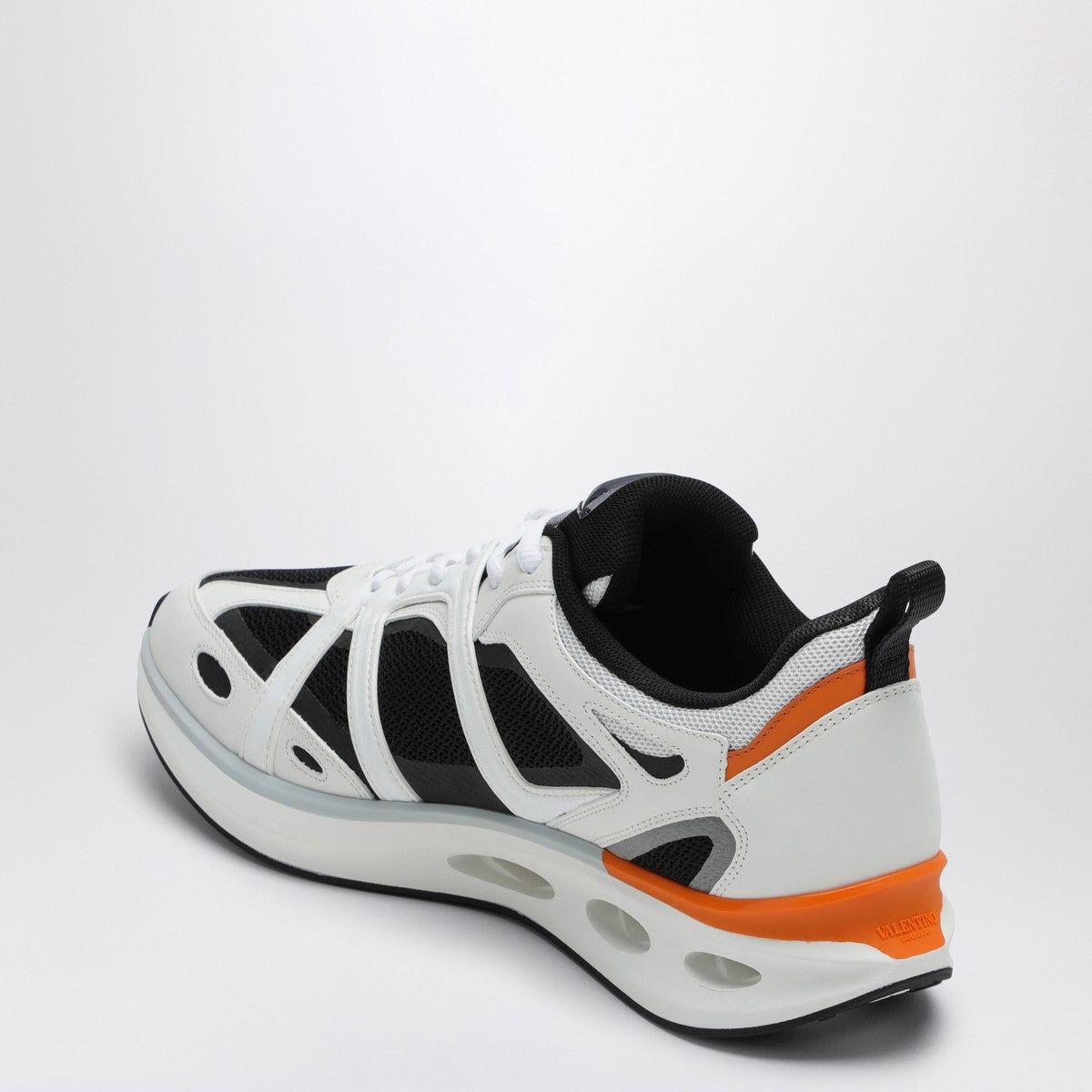 Valentino Garavani Vlogo Easyjog sneakers in white, black and orange leather