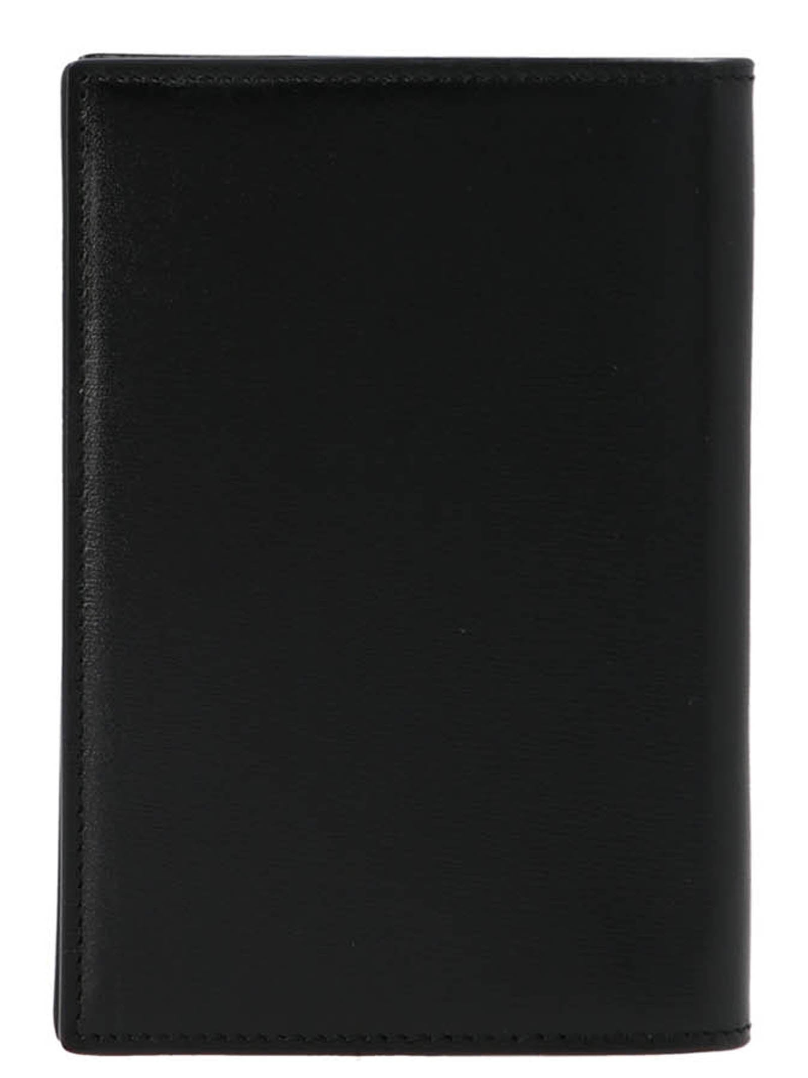 Saint Laurent Monogram Passport Holder — Travel Luxury