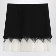 Alexander McQueen Mini skirt with black ivory spider lace
