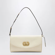 Valentino Garavani Butter leather Devain clutch with VLogo