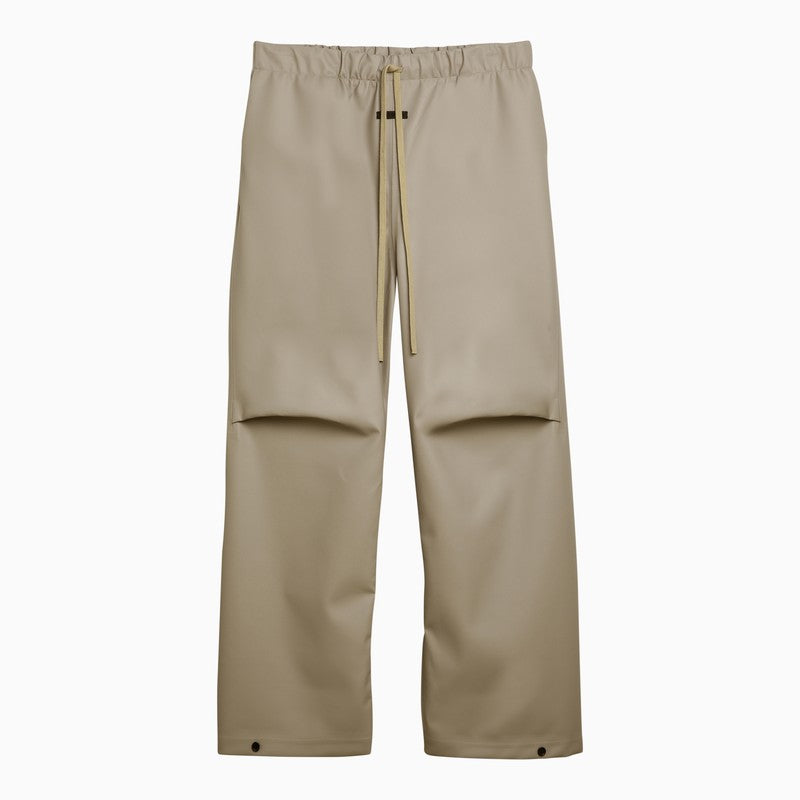 Fear of God Rubberized wide-leg trousers in Dune