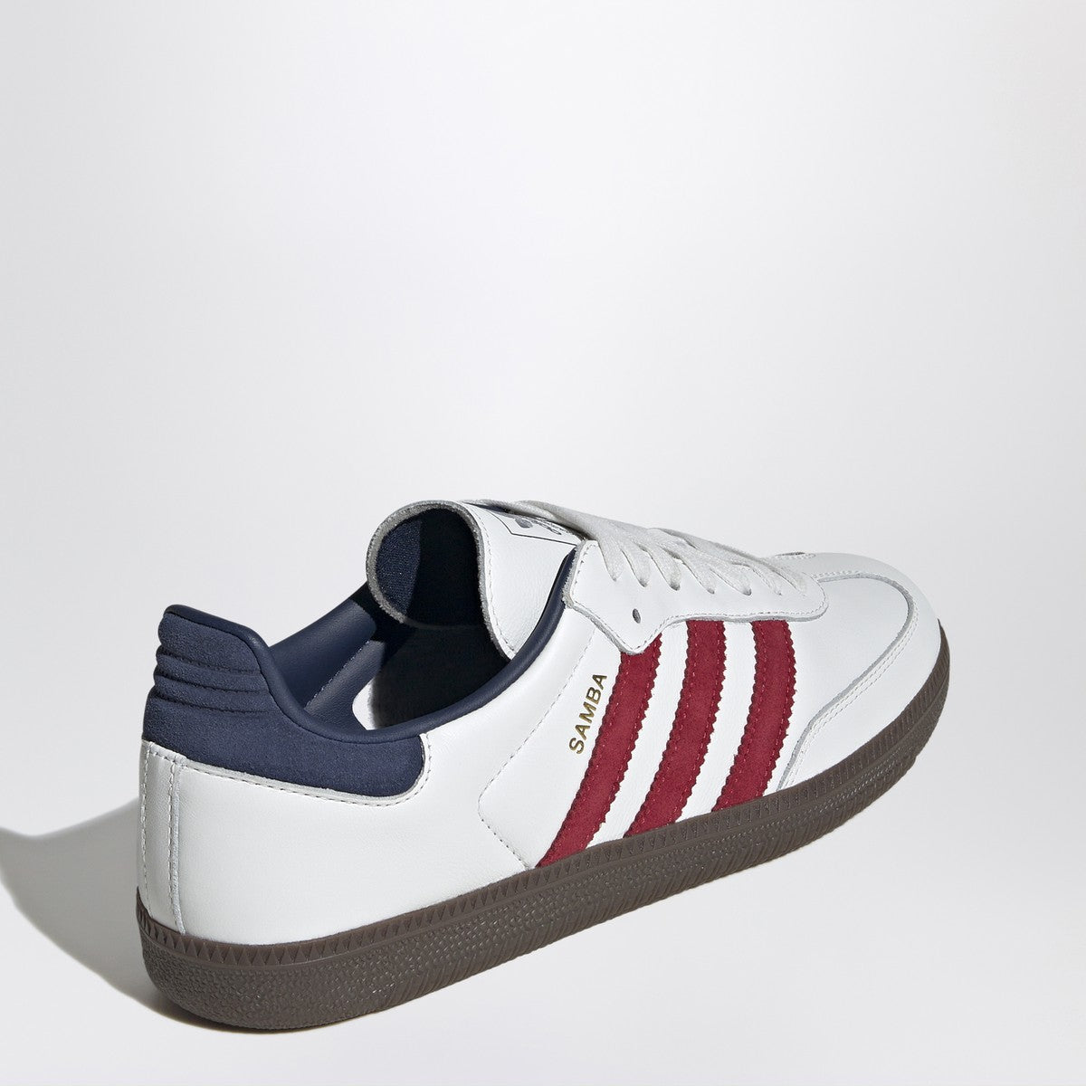 adidas Originals Samba OG sneaker in white leather with red and blue accents