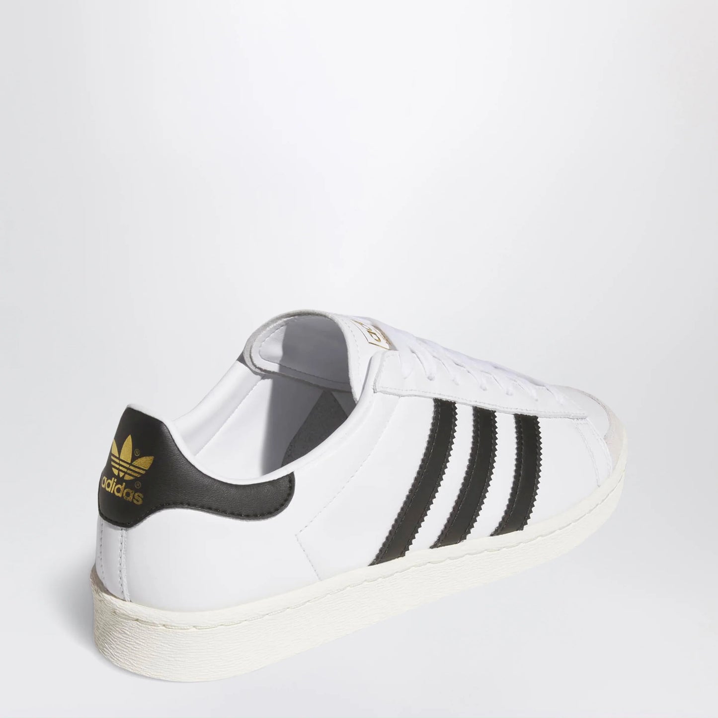 adidas Originals Jabbar Lo sneakers in white and black