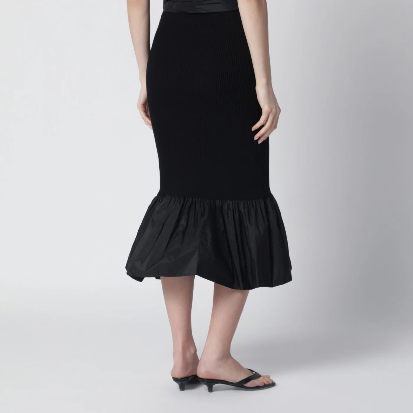 Patou Black skirt with faille ruffle hem