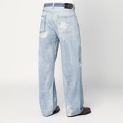 Our Legacy Light blue ripped faded jeans in cotton denim