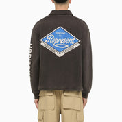 Polo de algodón efecto lavado negro con logotipo.