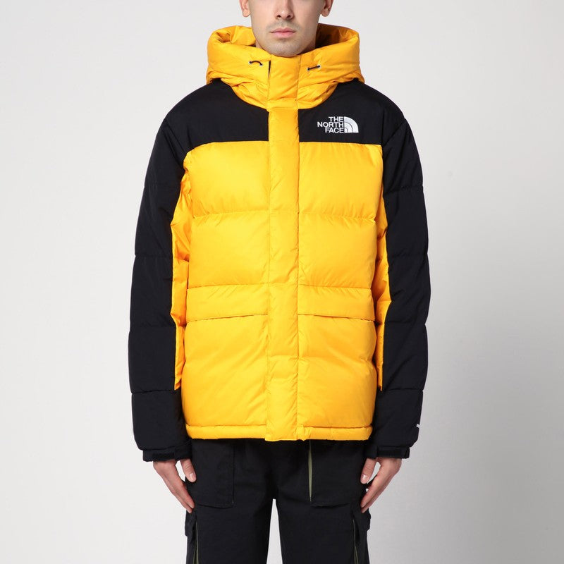 The North Face Himalayan down jacket in black and yellow
