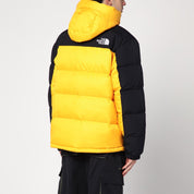 The North Face Himalayan down jacket in black and yellow