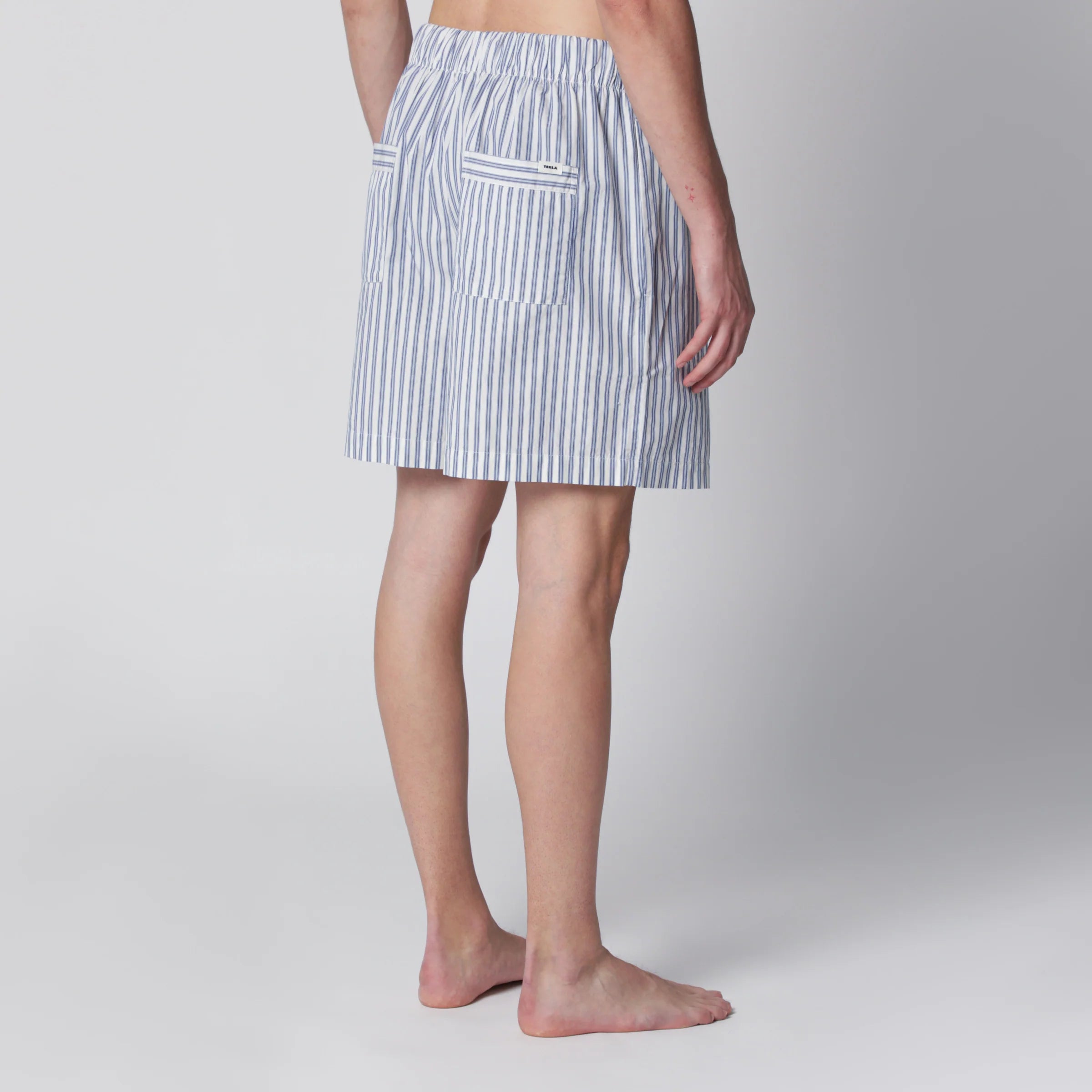 Tekla White/light blue striped pajama shorts