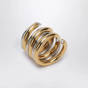 PANCONESI Spiral ring in gold and silver tone